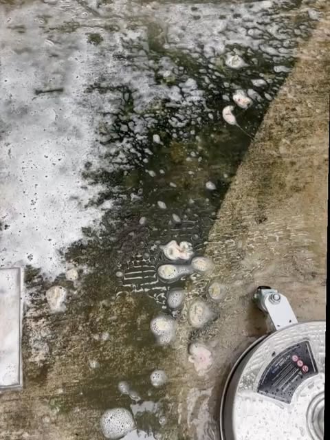 Pressure washing under way.