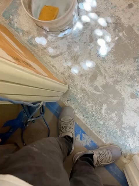 Prepping the floor before the install.